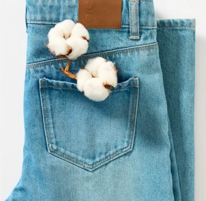 jeans avec fleur de coton dans la poche