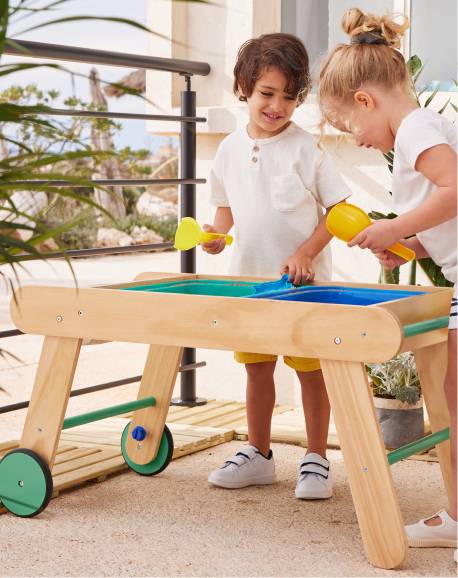 Table sable et eau en bois