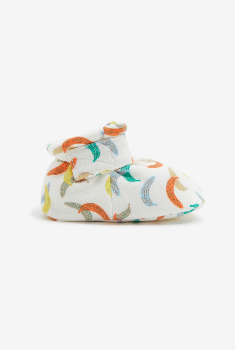 Patucos blanco marfil con motivos de plátanos Catimini para bebé 1