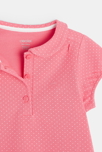 Polo de punto piqué con microlunares rosa bebé niña 2