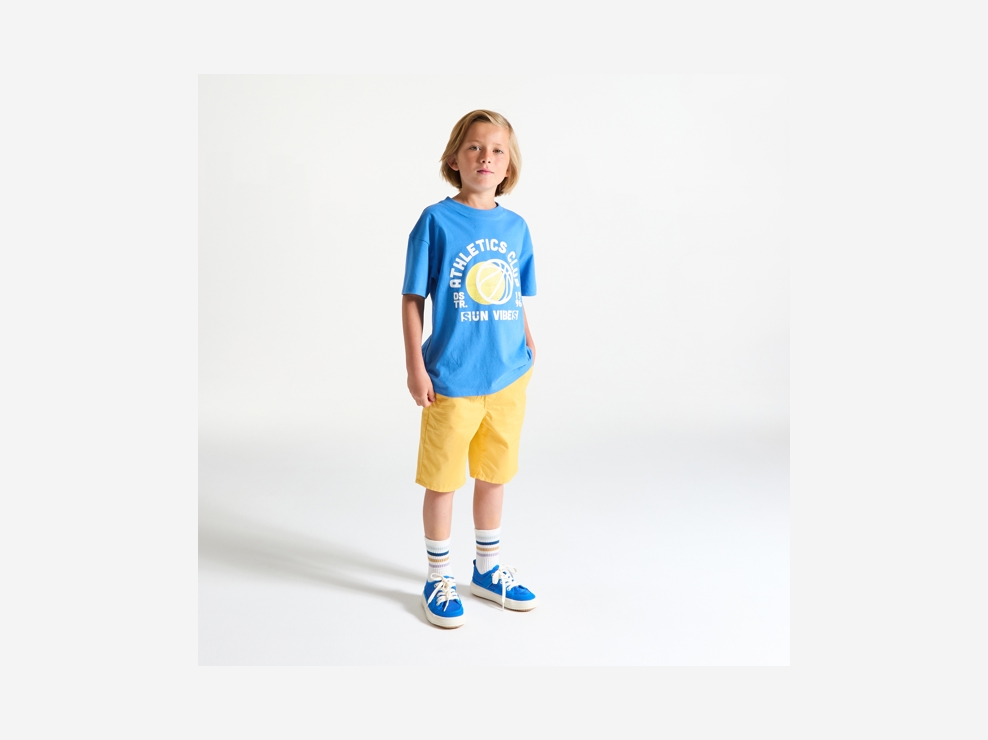Bermudas slim de tela lisa amarilla niño 1