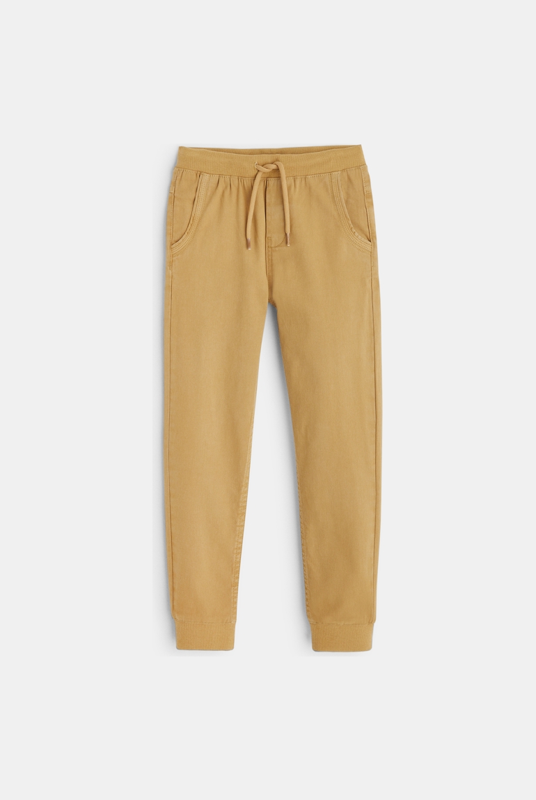 Jogpant uni en toile stretch beige garçon 1