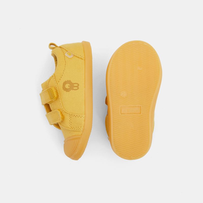 yellow velcro shoes