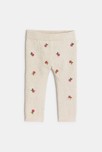 Legging tricot chiné blanc fleurs bébé fille