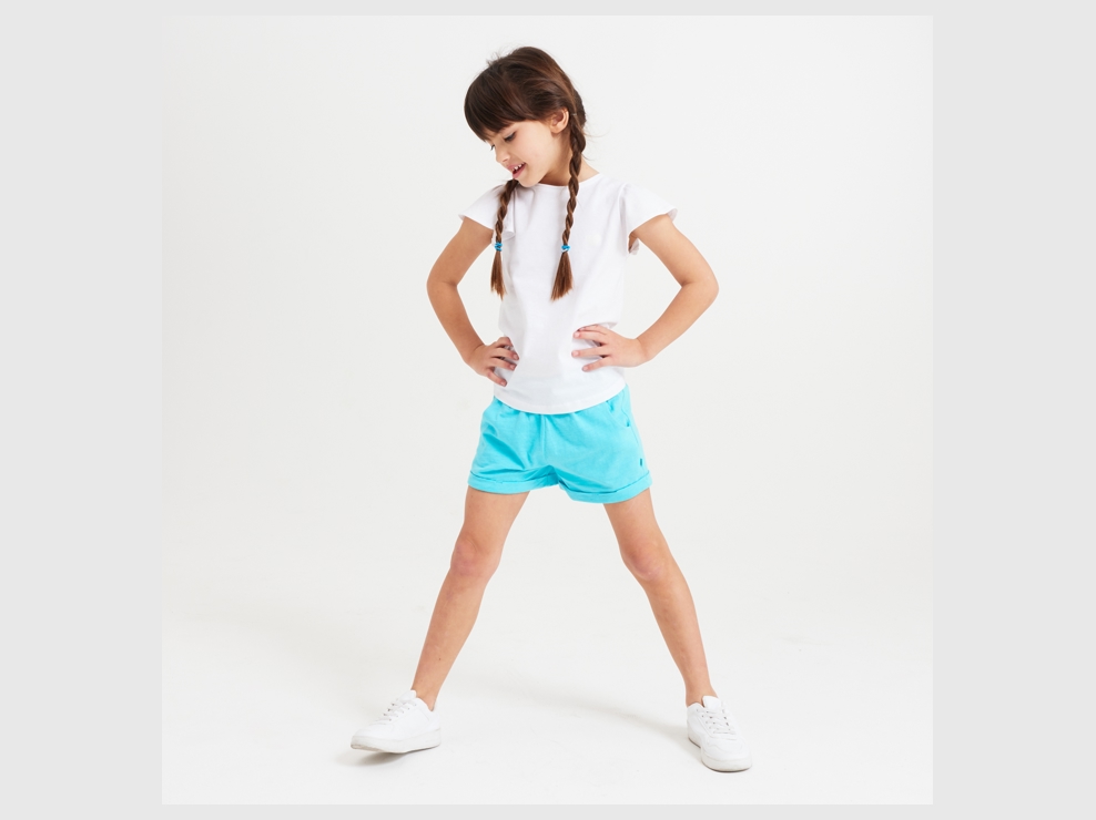 Short van effen blauw meisje 1