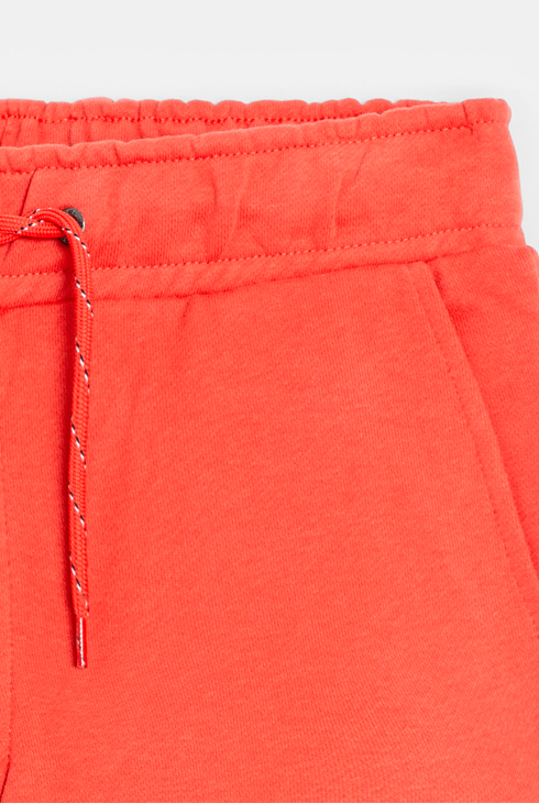 Unifarbene Jogginghose orange mit Cargo-Taschen Jungen