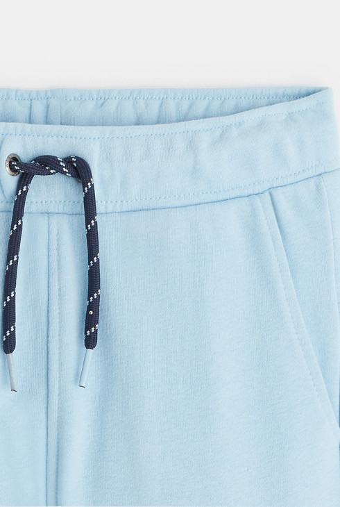 Unifarbene Jogginghose mit Cargo-Taschen Blau Jungen 2