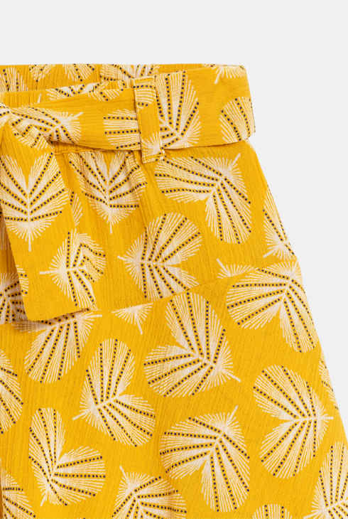 Dekliško rumeno potiskano hlačno krilo 2