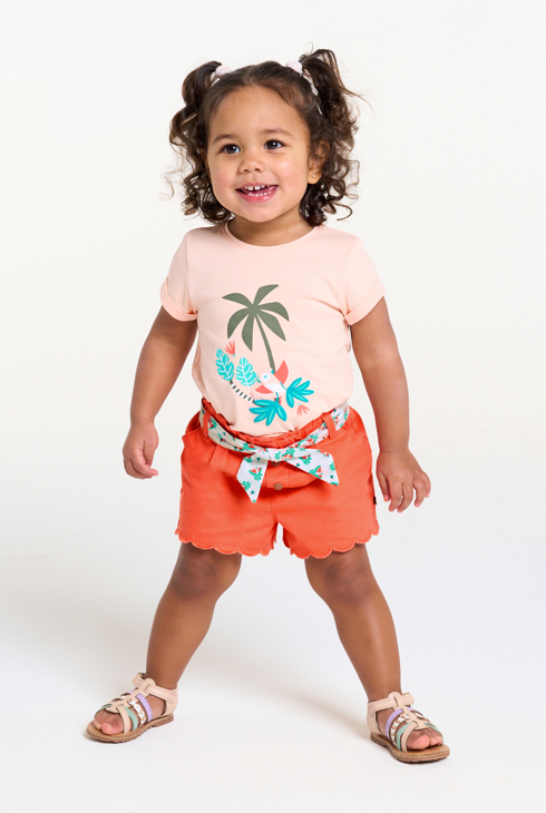 Festonierte orangefarbene Shorts mit bedrucktem Gürtel Baby Mädchen 1