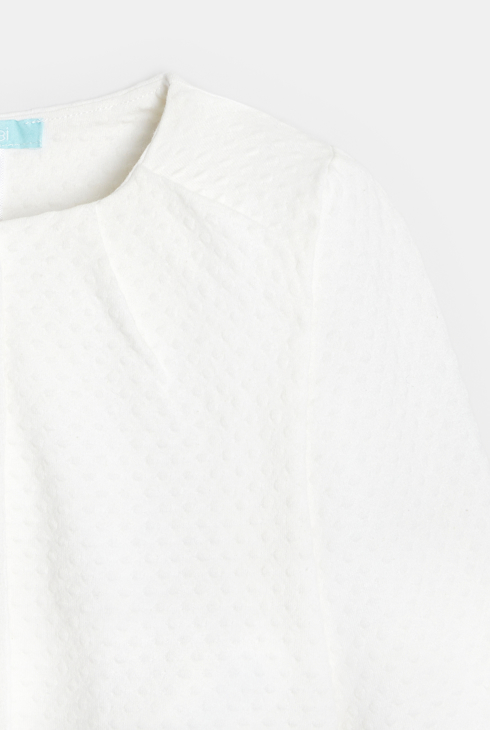 Gilet en maille effet pois blanc bébé fille