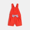 Salopette short coton fantaisie rouge bébé fille