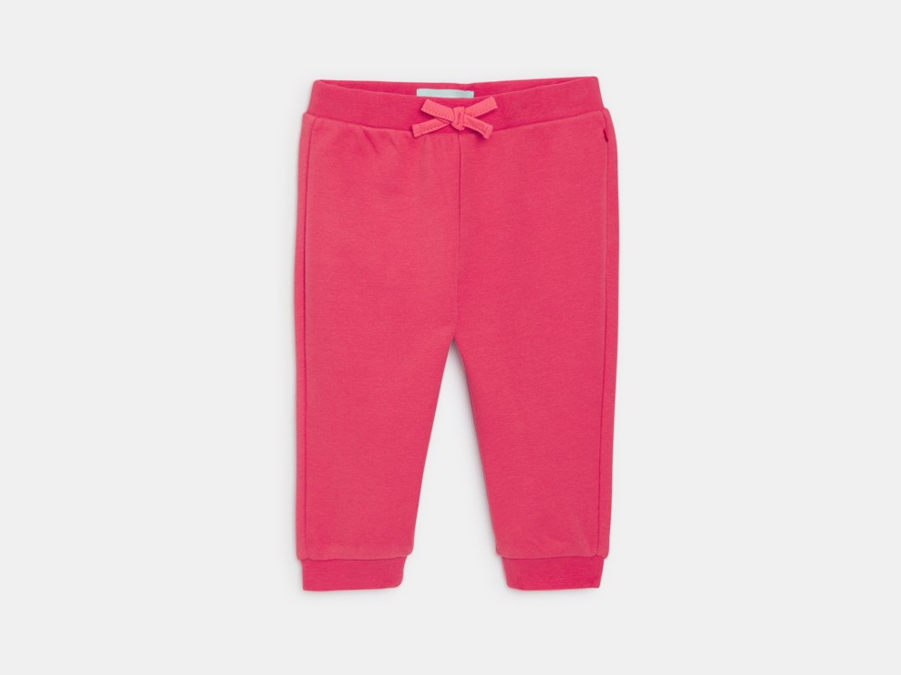 Joggers rossi in tessuto felpato per neonata 1