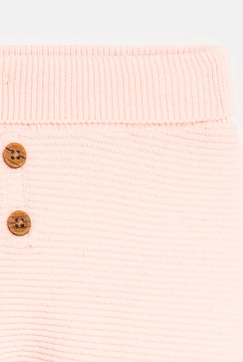 Pantalon à pieds en maille rose naissance