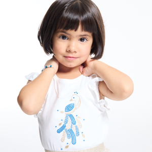 Baby girl's white T-shirt with a shiny peacock 1