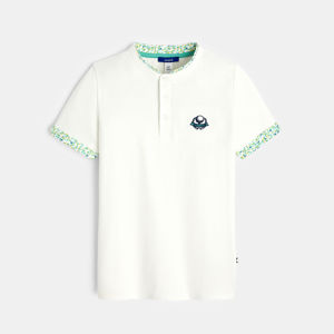 Boy's white short-sleeve polo shirt. 1