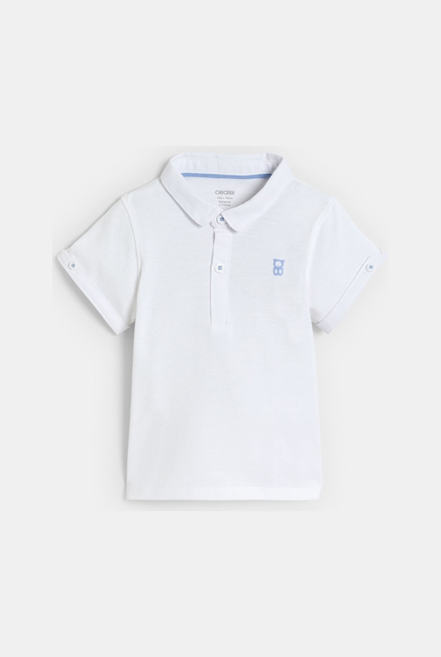 Kurze grüne Latzhose und weißes Poloshirt aus Piqué-Gewebe Kleinkind Junge