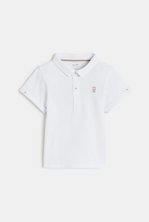 Salopette courte beige et polo maille piquée blanc bébé garçon