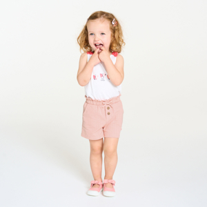 Baby girl's pink shorts in lightweight textured cotton 1