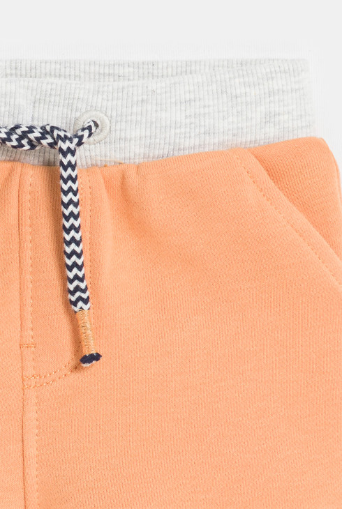 Dekliške oranžne pletene kratke hlače z elastiko v pasu za dojenčke 2