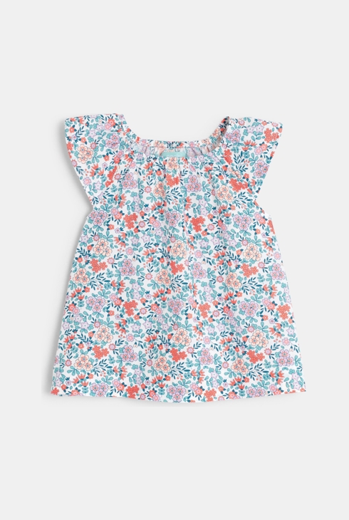 Blouse fleurie et short bleu bébé fille