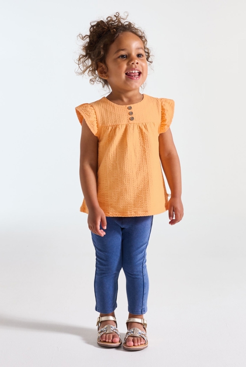 Baby girl's orange cotton seersucker blouse 1