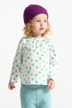 Blusa cuello elástico de flores blanca bebé niña 1