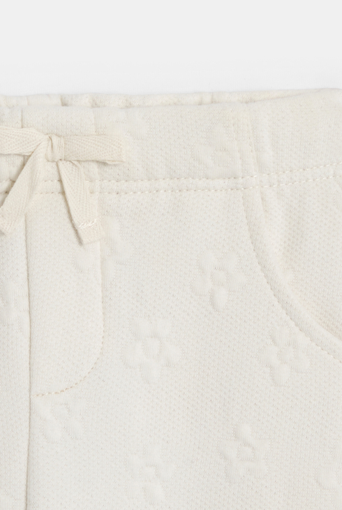 Pantalon molleton effet piqué blanc bébé fille