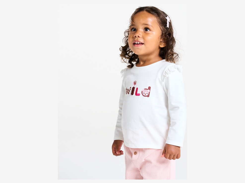 T-shirt a maniche lunghe bianca con animali per neonata. 1