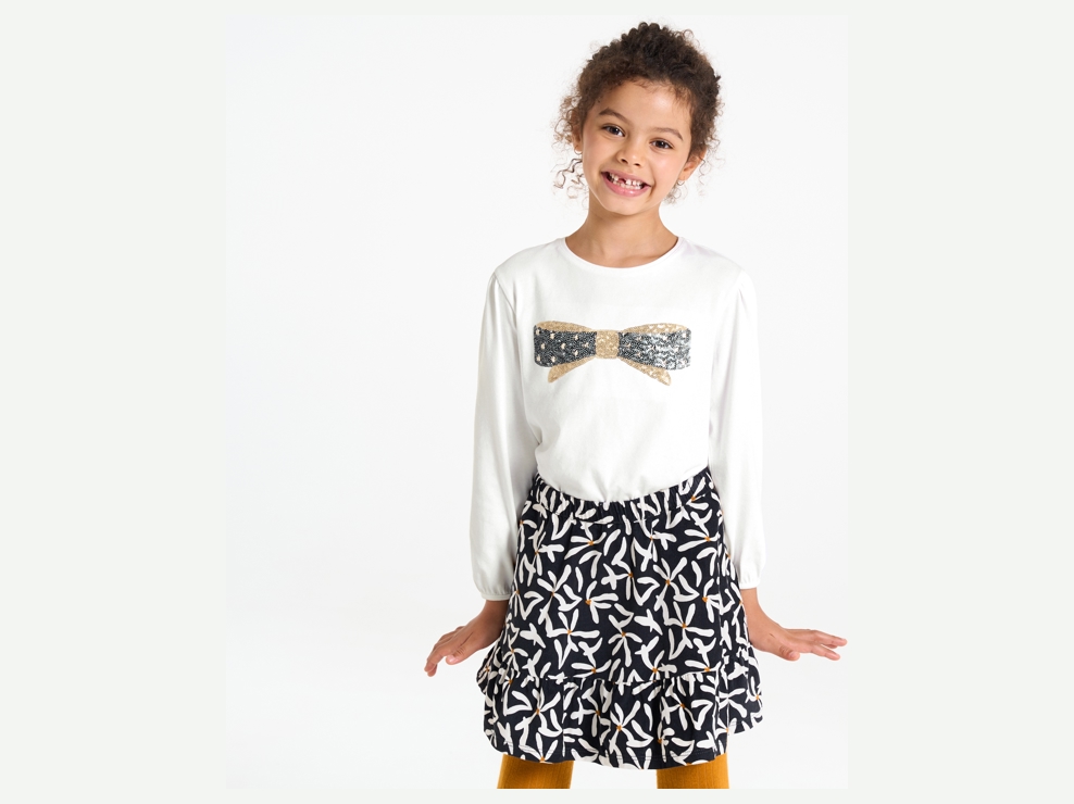 Camiseta de lentejuelas blanca para niña 1