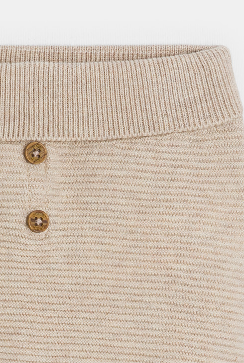 Newborn beige knitted trousers with feet 2
