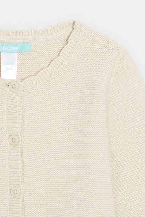 Beige melierte Baby-Weste aus verspieltem Strick für Mädchen 2