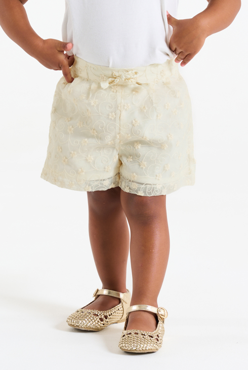 Baby girl's chic white embroidered shorts with darts 1