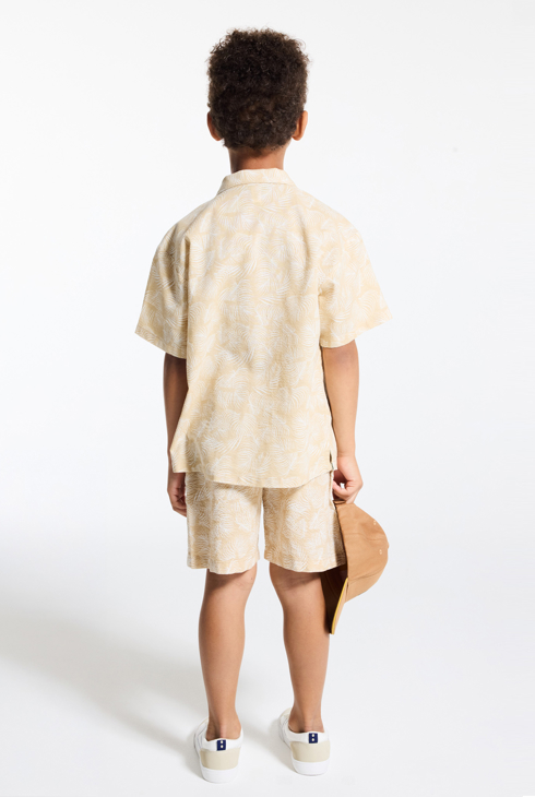 Bermuda in cotone beige con stampa fantasia neonato 1