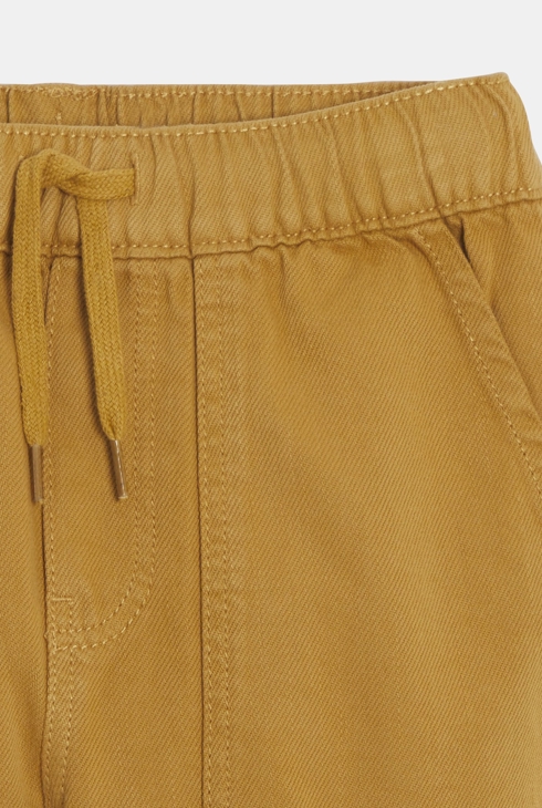 Chinohose aus ockergelbem Stoff für Jungen