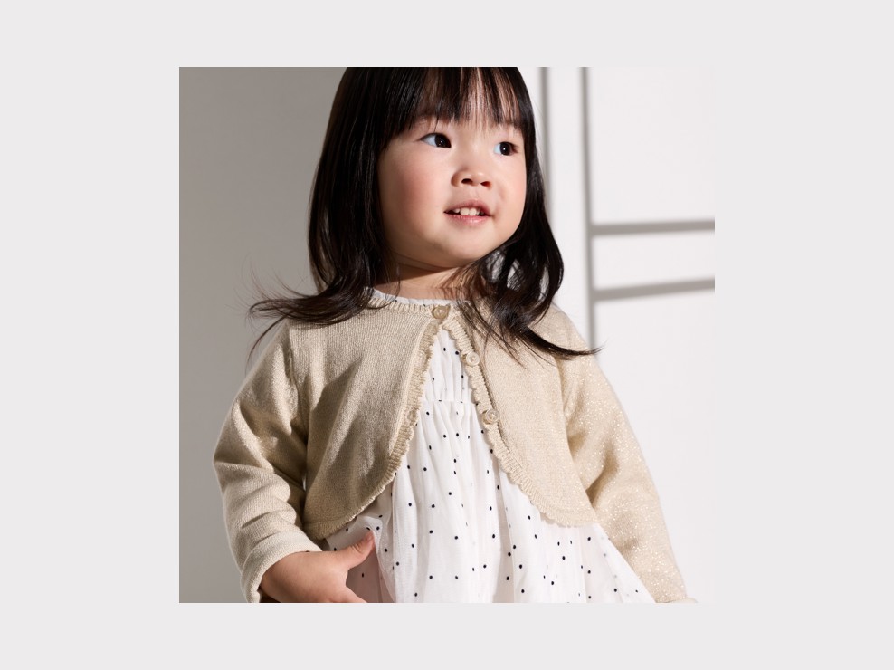 Lichtbeige gebreide bolero voor babymeisjes 1