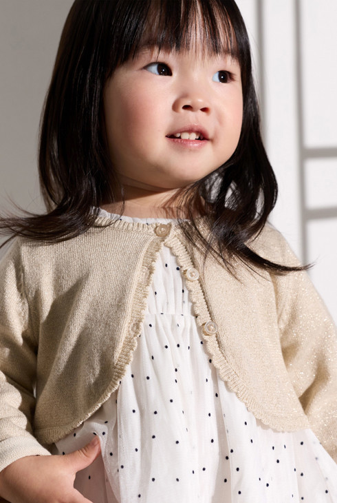 Lichtbeige gebreide bolero voor babymeisjes 1
