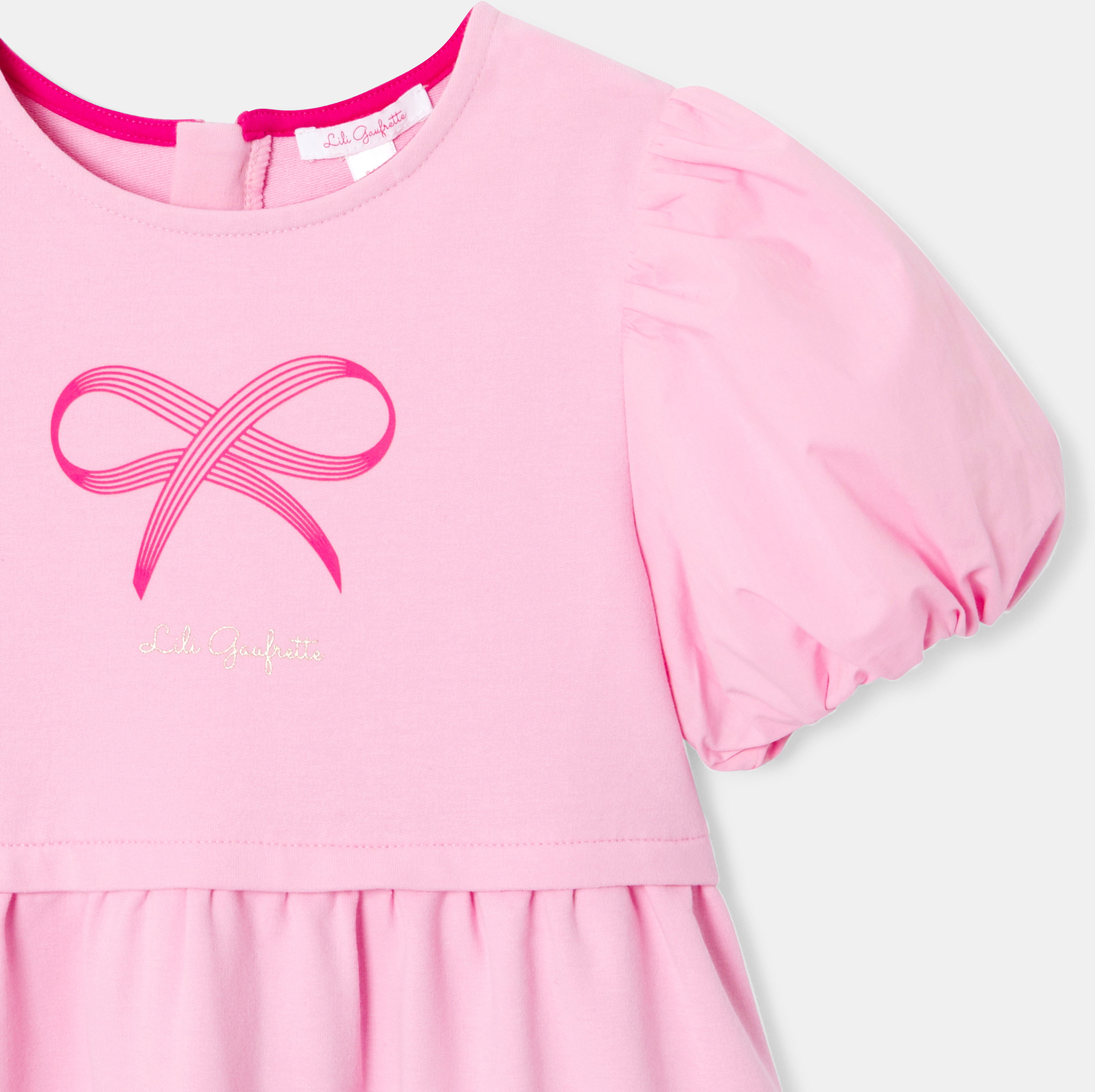 Rosa Kleid mit kurzen Ballonärmeln für Mädchen. 2