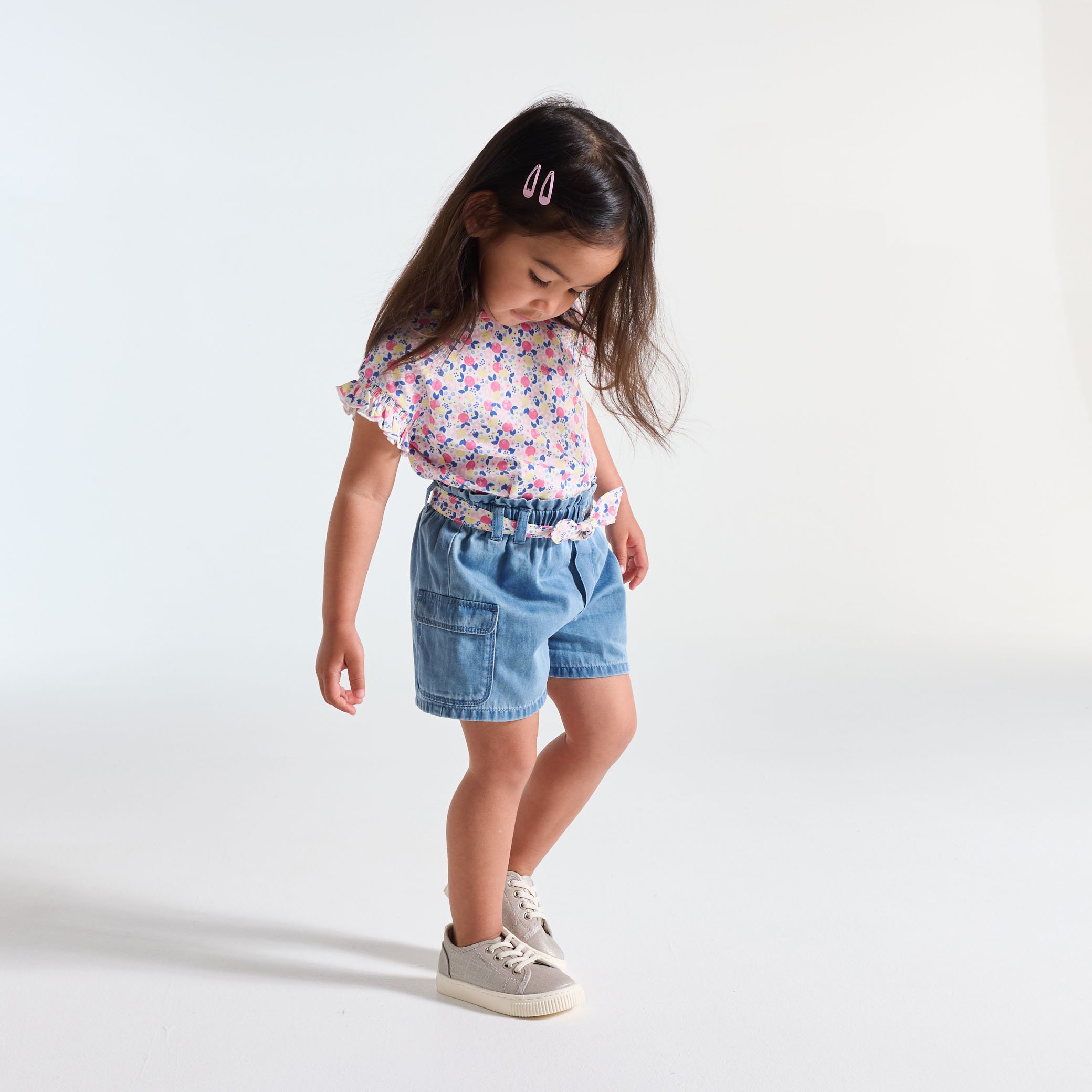 Baby girl's lightweight blue denim cargo shorts with floral