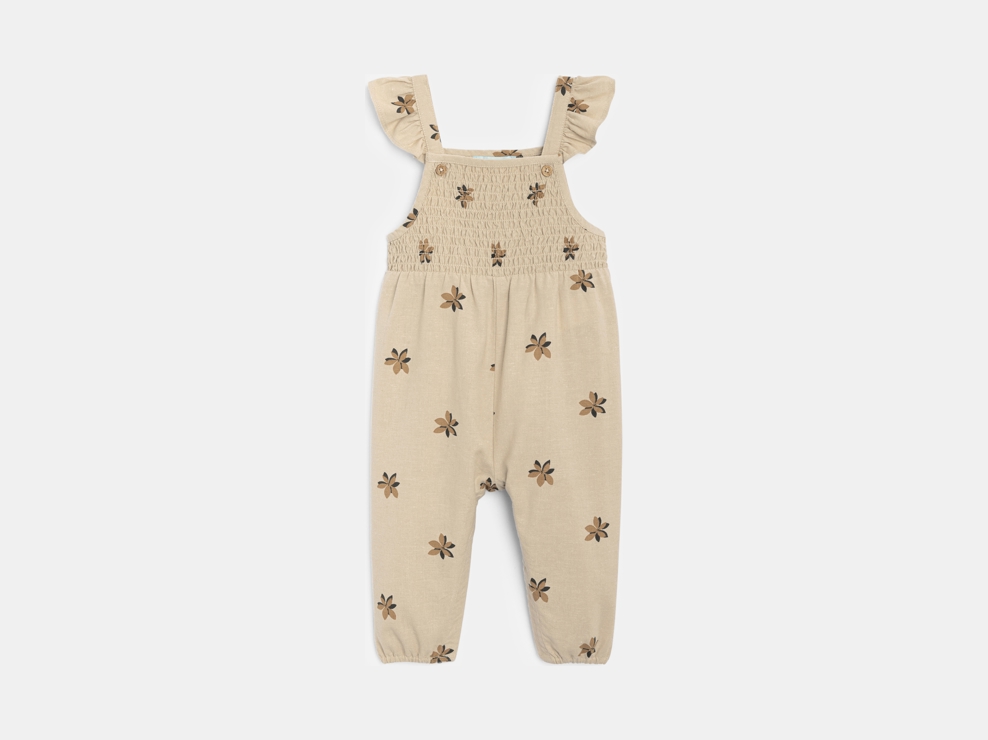 Salopette a punto smock beige a fiori in cotone e lino per neonata 1