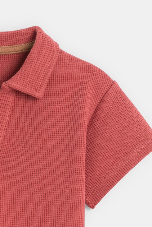 Rosa Poloshirt aus Waffelstoff Kleinkind Junge 2