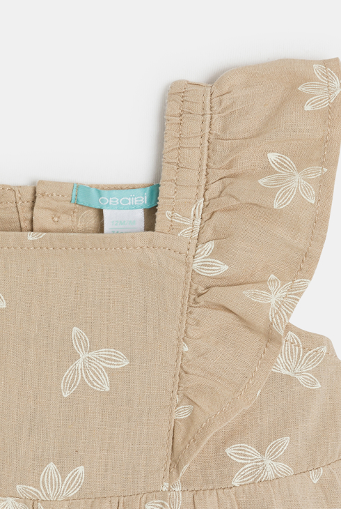 Kurzer Overall aus Leinen und Baumwolle mit Blumenmuster in Beige für kleine Mädchen.