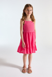 Vestido de tirantes detalle crochet y volante rosa niña 1