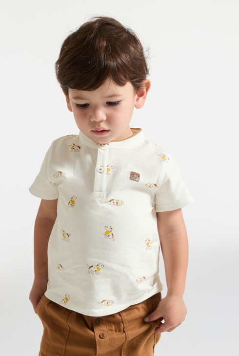 Polo in maglia piqué gialla con cane per neonato 2