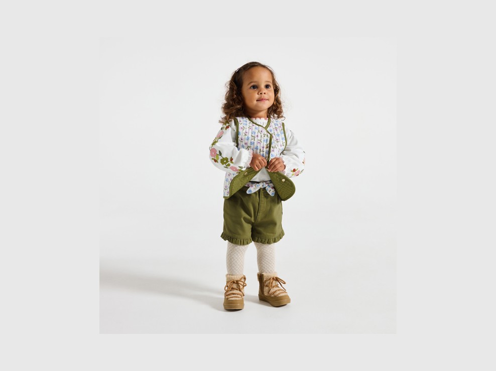 Groene omkeerbare bodywarmer voor babymeisjes 1