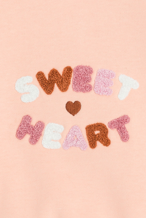 Sweat brodé à volants rose bébé fille