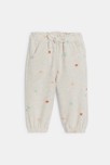 Pantalon fille beige motif cœur