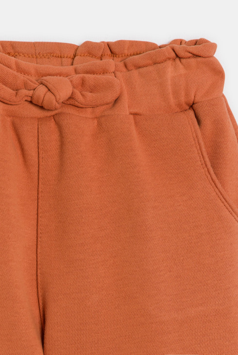 Pantalon fille orange avec nœud
