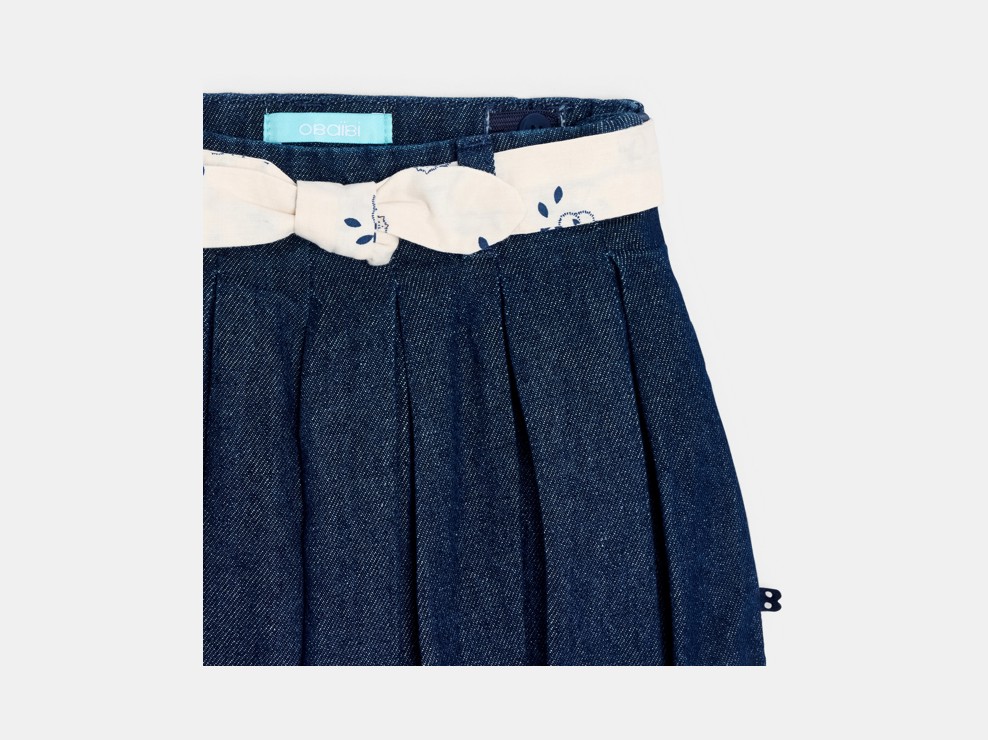 Falda corta plisada denim crudo azul bebé niña 2