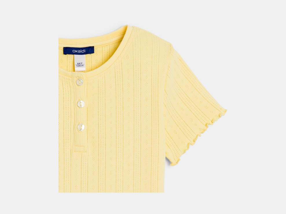 Żółta gładka koszulka z ażurowymi wstawkami z krótkim rękawem dla dziewczynki 2