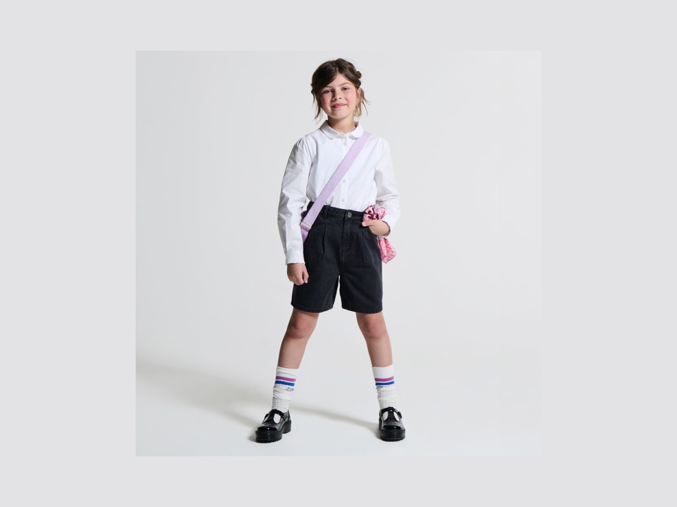 Czarne bermudy ze spranego jeansu dla dziewczynki 1